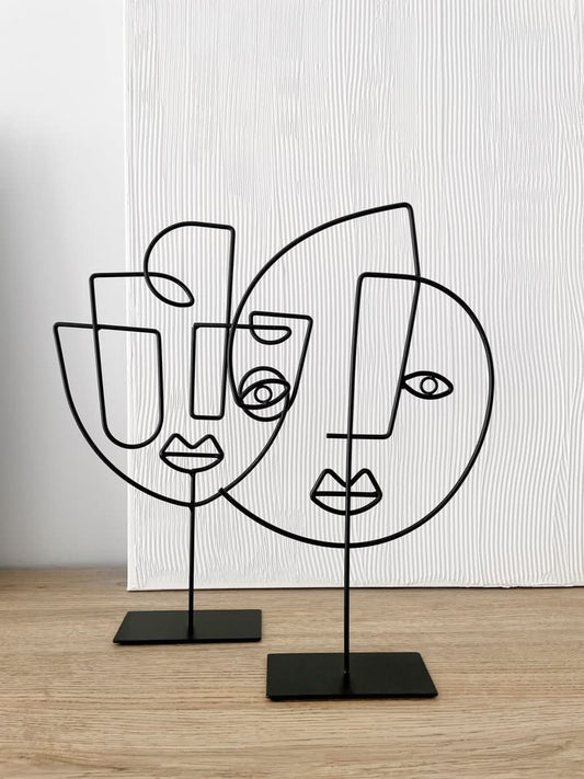 Pareja de Figuras Decorativas Cara de Hierro - IVI