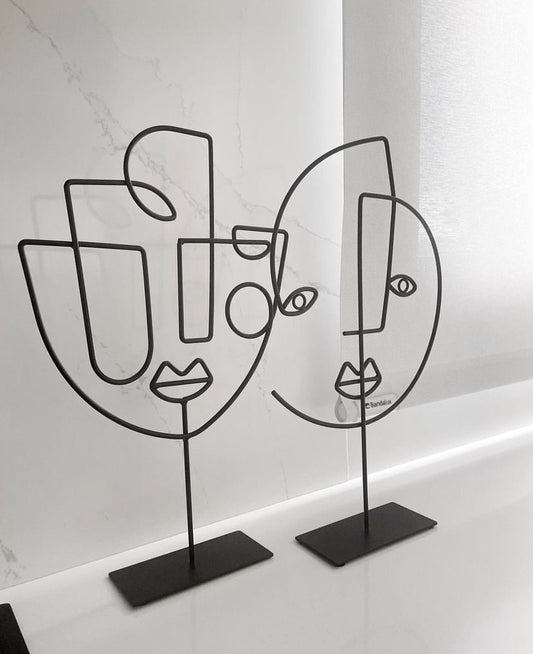 Pareja de Figuras Decorativas Cara de Hierro - IVI